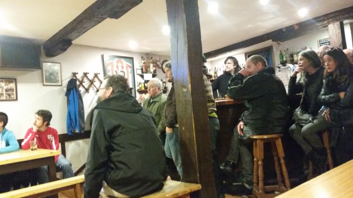 Incognito photo of bummed locals after their soccer team lost by an own goal.