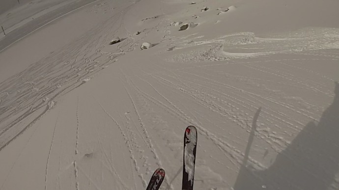 A screen grab from Chris' helmet cam as he descends the powder face we milked 3 runs on
