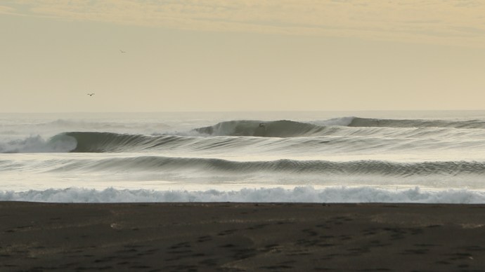 This is the wave that was dead flat when Brant and I were there previously. Now the sand was in and the rides were loooong.