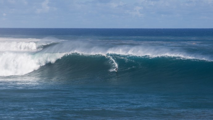 Here's some perspective for you on the size out there. Uti Araki, towed in by Rene.