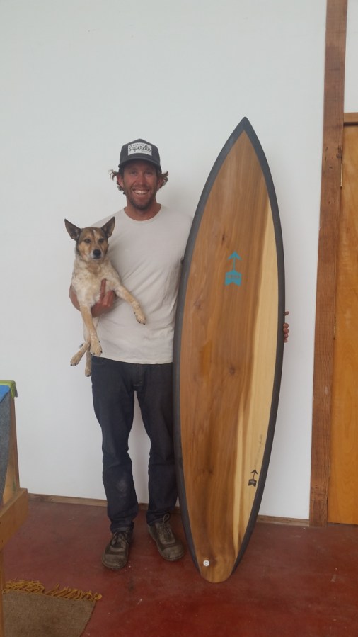 I ran into Danny Hess just after visiting 3 surf shops looking for a good 6'8" to buy for my trip to Chile. He told me he had one board -- exactly a 6'8" -- for sale from a recent batch. It is the "Banjo" model, and this is Danny (who is 6'4") holding his dog, Banjo, while posing next to the board